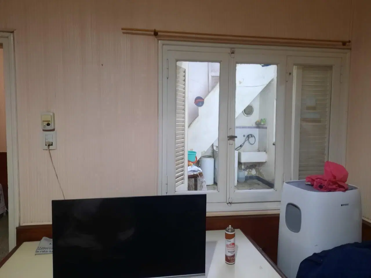 Departamento de pasillo- Dos dormitorios- Patio y Terraza-Dorrego 400- Zona Río-Rosario 5