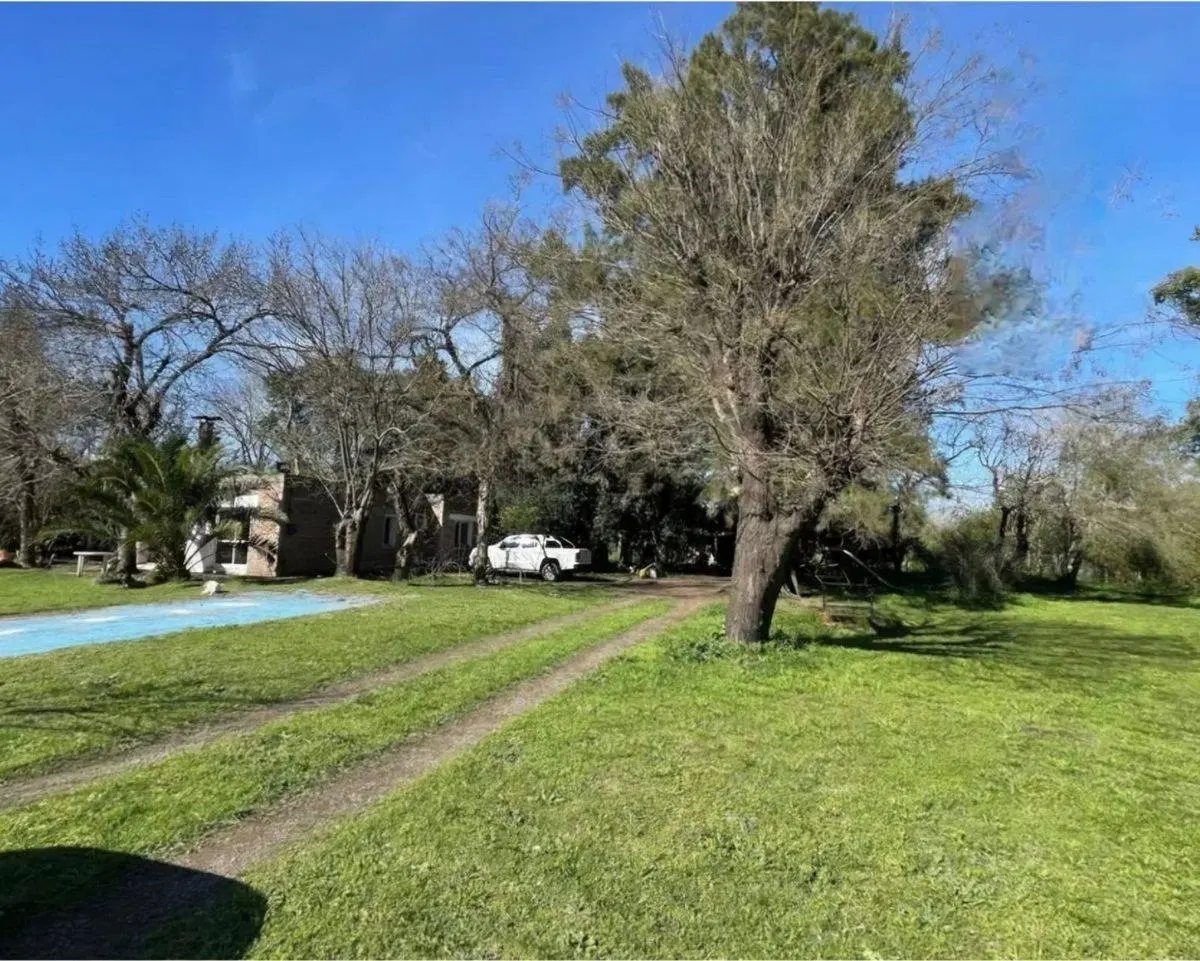 LOTE  CON CASA EN VENTA EN CHACRAS DE CANNING 4