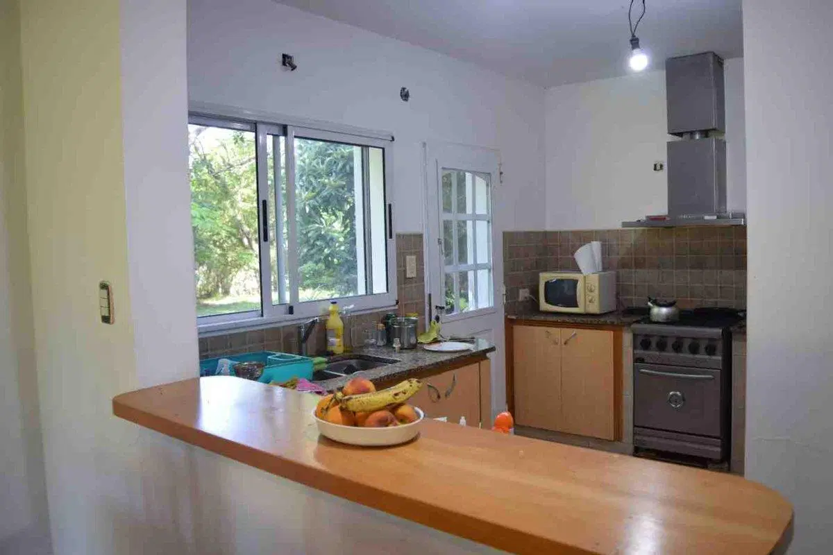 LOTE  CON CASA EN VENTA EN CHACRAS DE CANNING 2