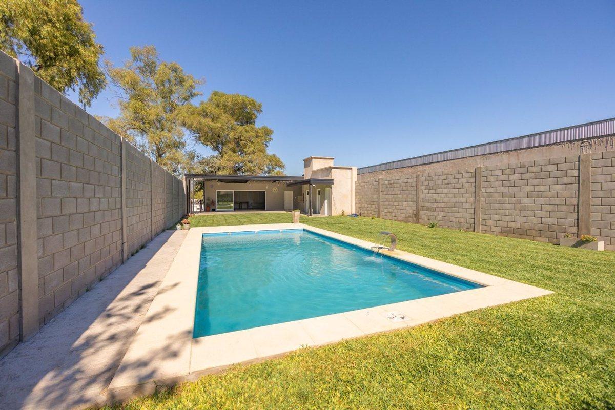 Foto de TERRENO CON MEJORAS EN VENTA EN BURZACO, imagen 4