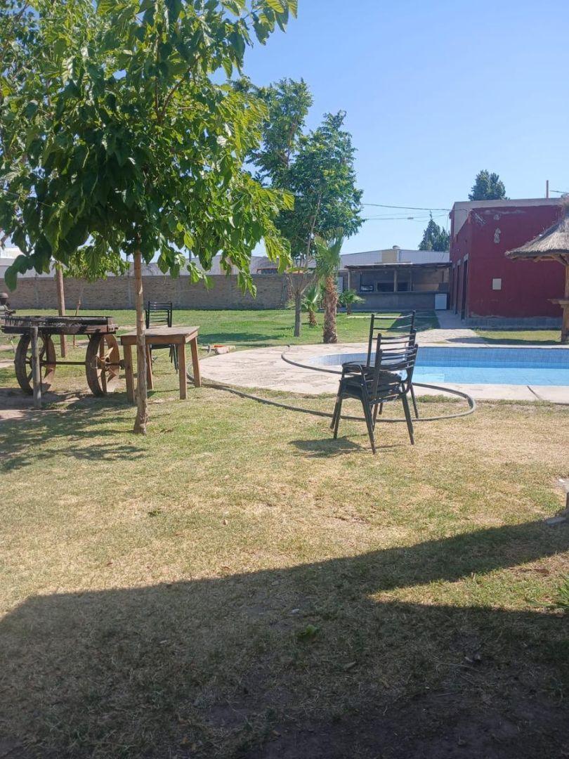 Foto de Salón multiespacio, con loft, piscina y local comercial, imagen 5