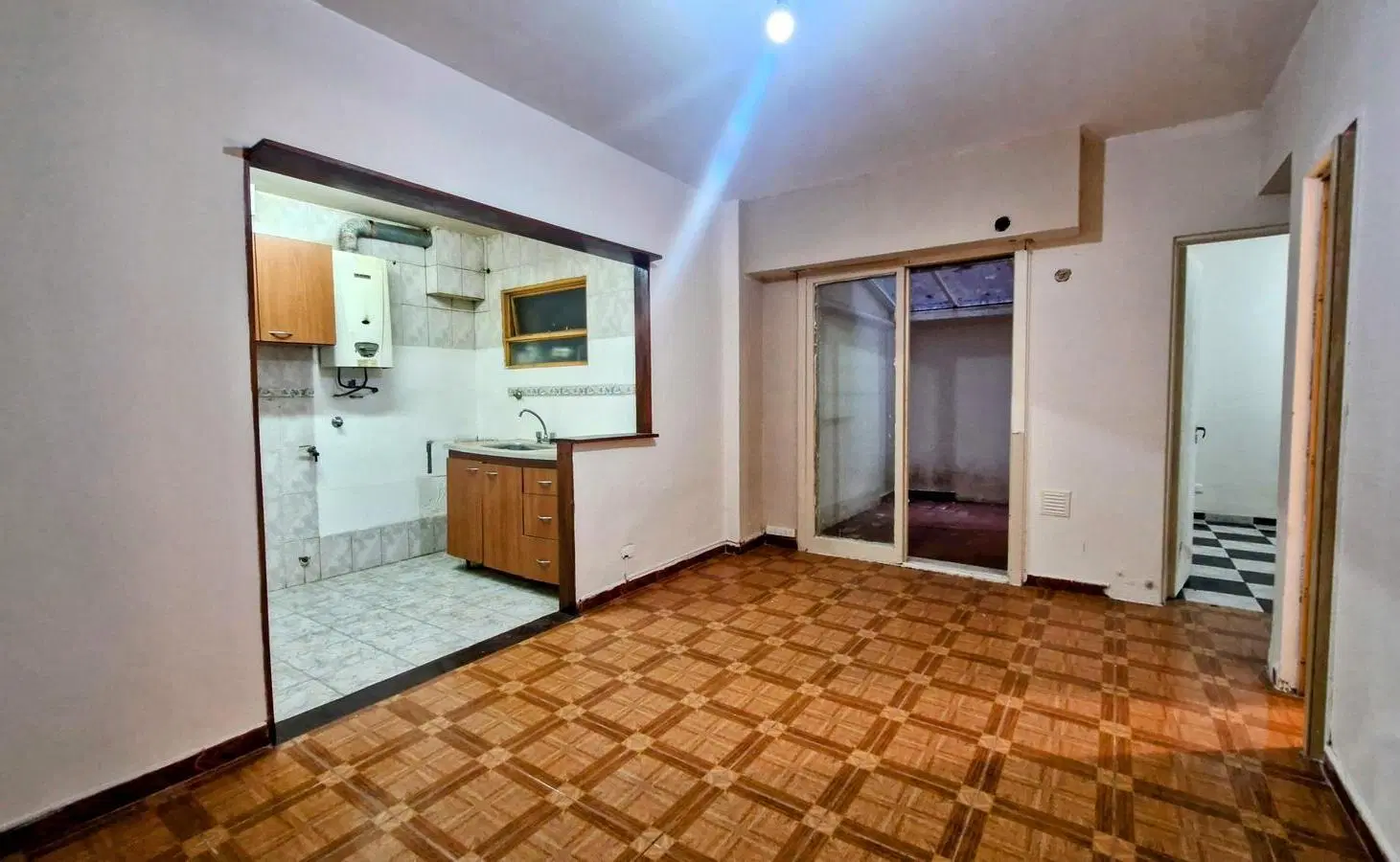 VENTA DEPARTAMENTO 2 AMBIENTES CON COCHERA EN CID CAMPEADOR CABALLITO 5