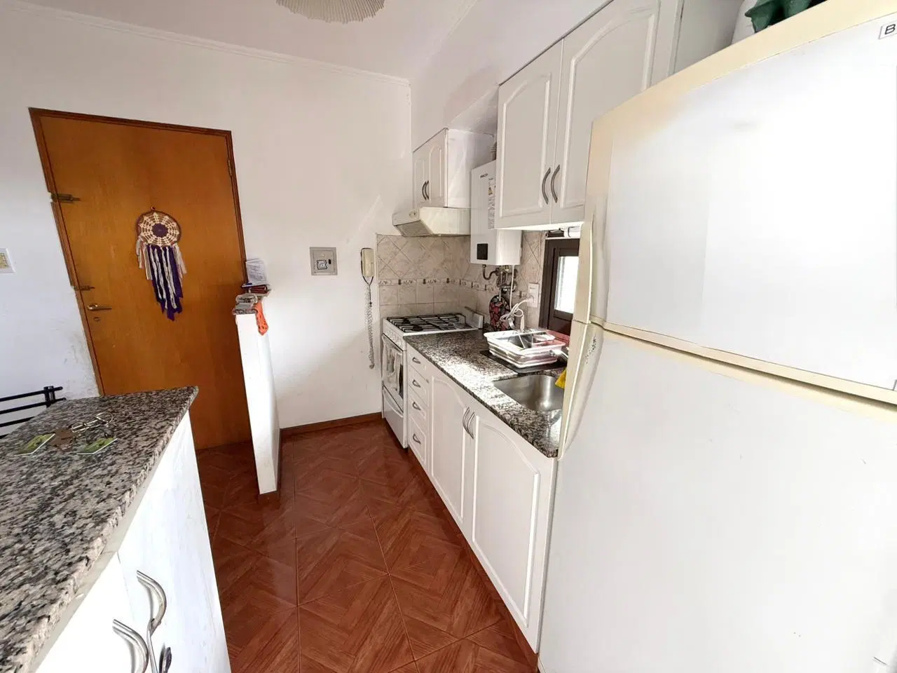 Departamento de 1 dormitorio con doble balcón y parrillero 5