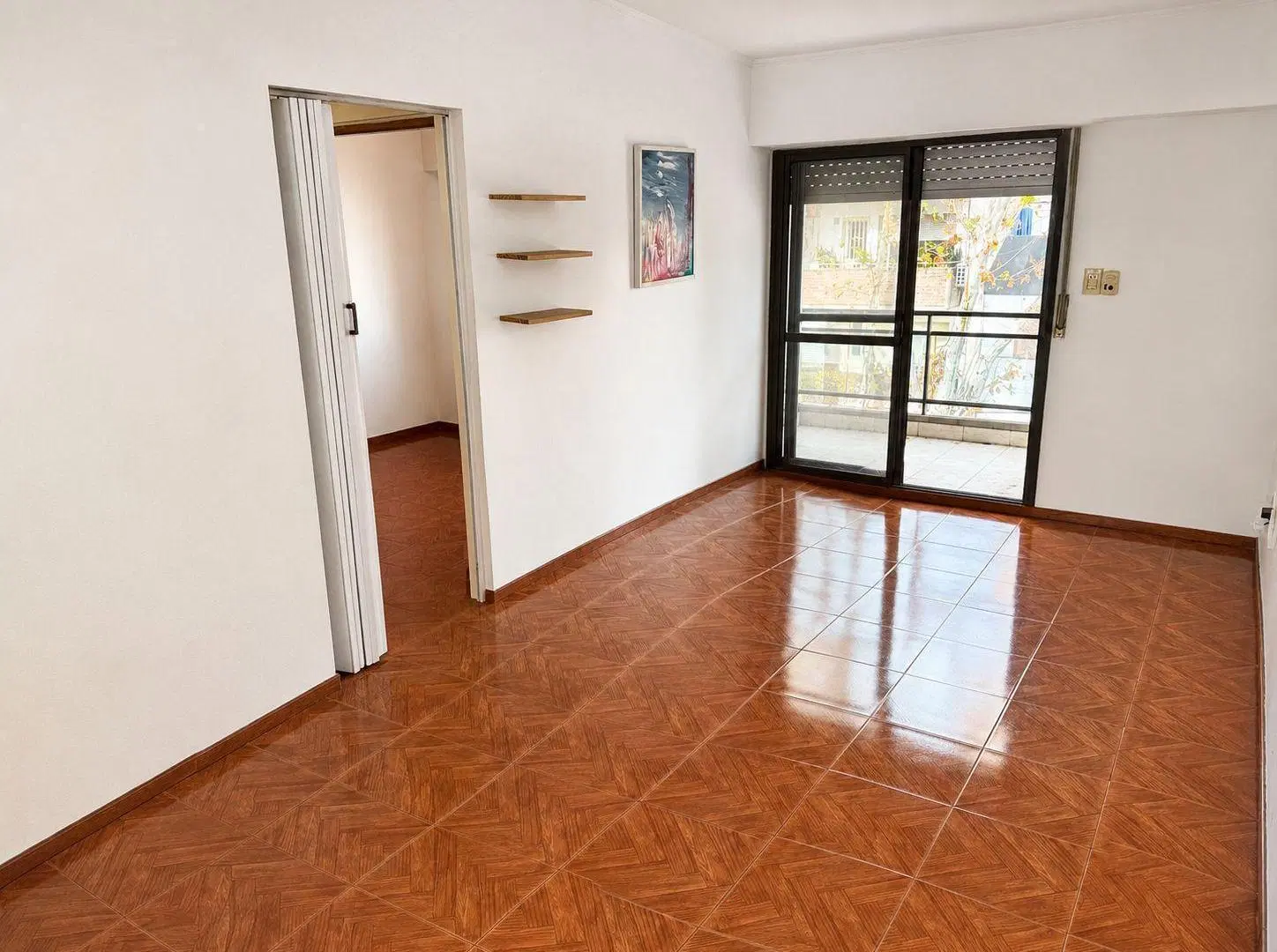 Departamento de 1 dormitorio con doble balcón y parrillero 3