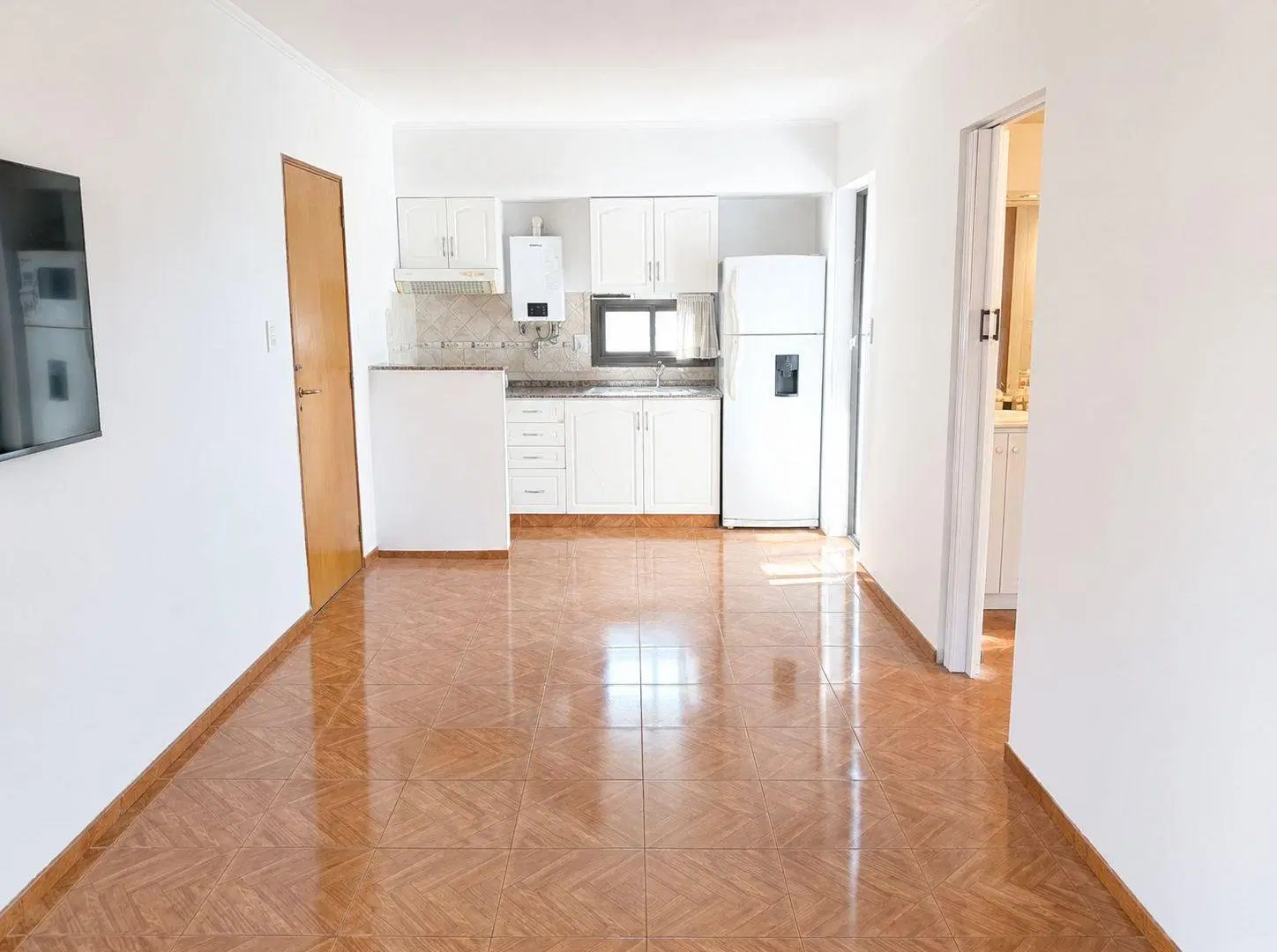Departamento de 1 dormitorio con doble balcón y parrillero 1
