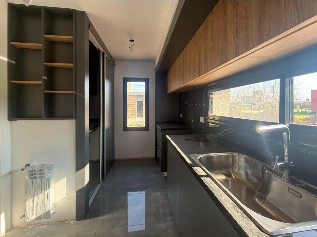 Casa PREMIUM de 2 dormitorios con patio y cochera en Tierra de Sueños 3 4