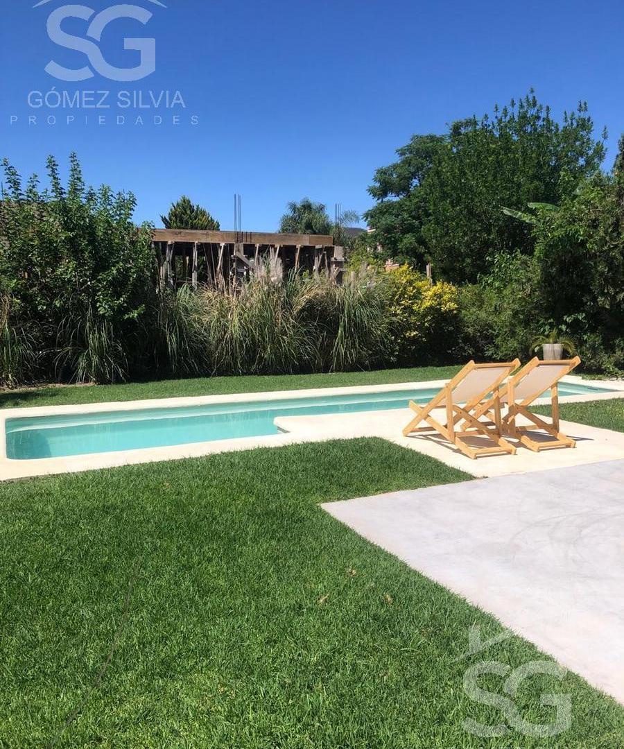 Foto de Casa en alquiler 5 dormitorios. Barrio Cerrado Altos del Sol, imagen 2