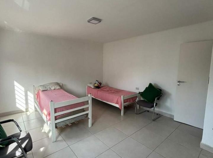 VENTA  CASA DE 2 PLANTAS CON PILETA Y QUINCHO 4
