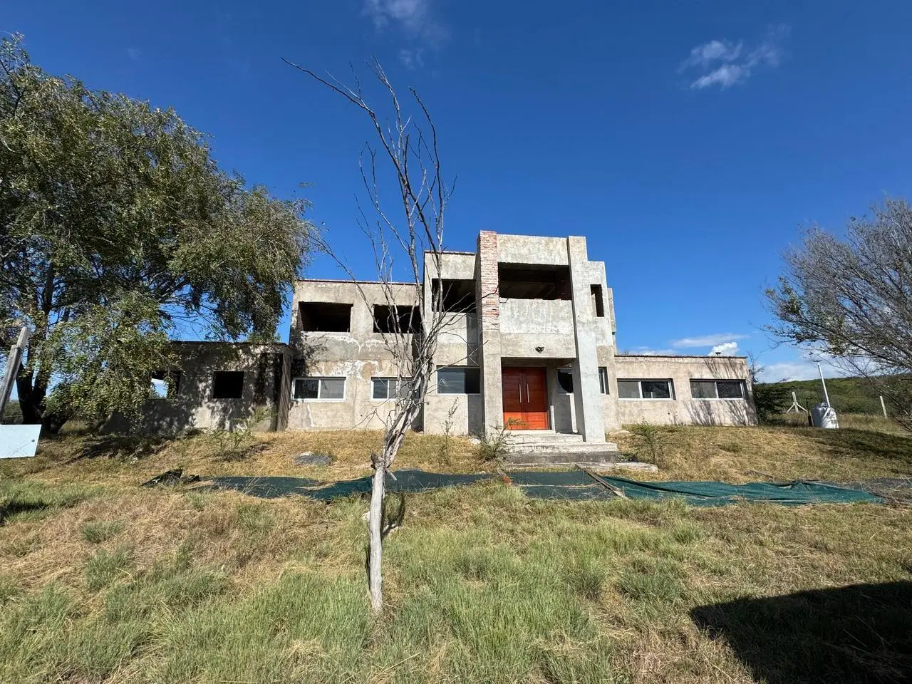 VENTA CASA EN COUNTRY ALTOS CARLOS PAZ A TERMINAR 1
