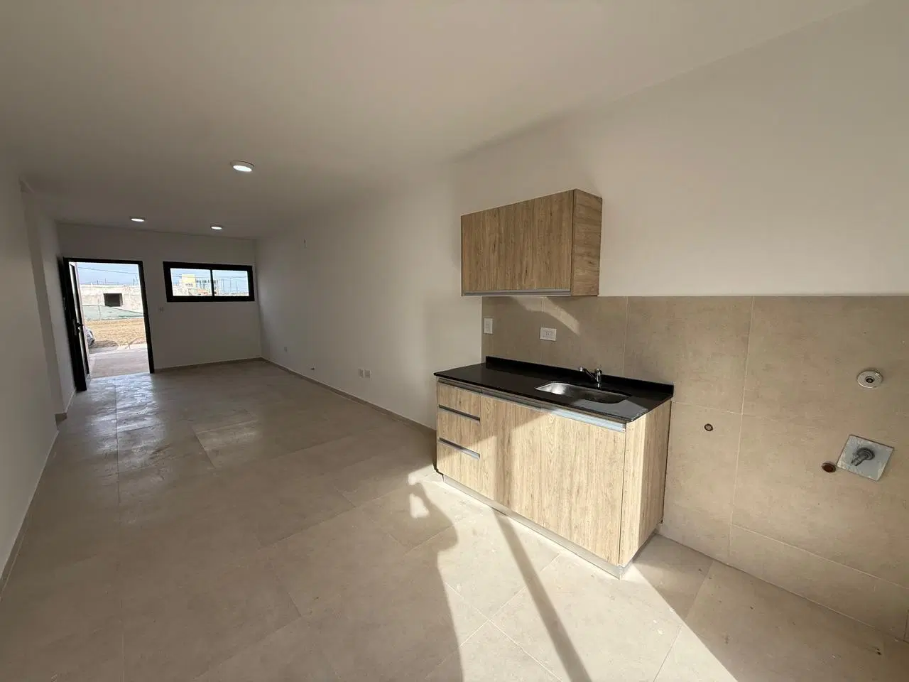 Dúplex a estrenar en Docta | 2 dormitorios en planta baja , 2 baños . con jardín 4