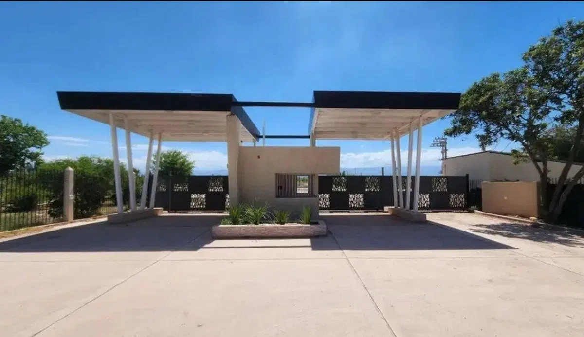 LOTE CON PISCINA, BARRIO ATARDECERES DE VIEYTES 5