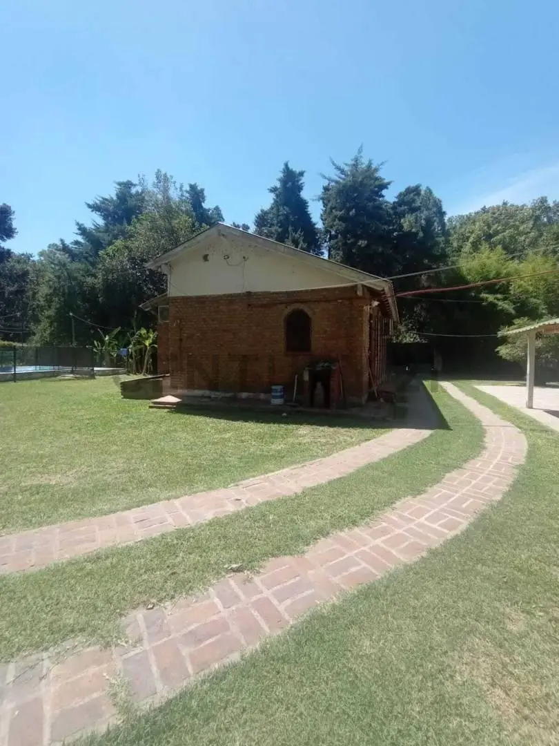 Venta 2 Lotes con dos casas ,quincho y pileta en General Rodriguez 5