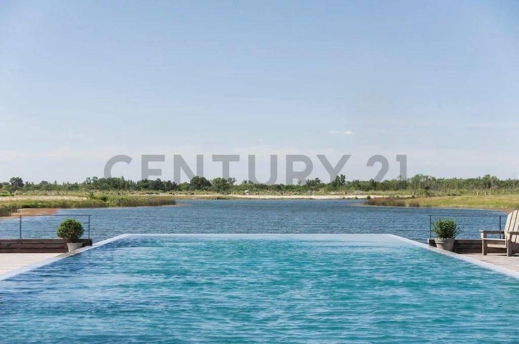 Foto de LOTE EN VENTA A LA LAGUNA EN EL NAUDIR, AGUAS PRIVADAS., imagen 1