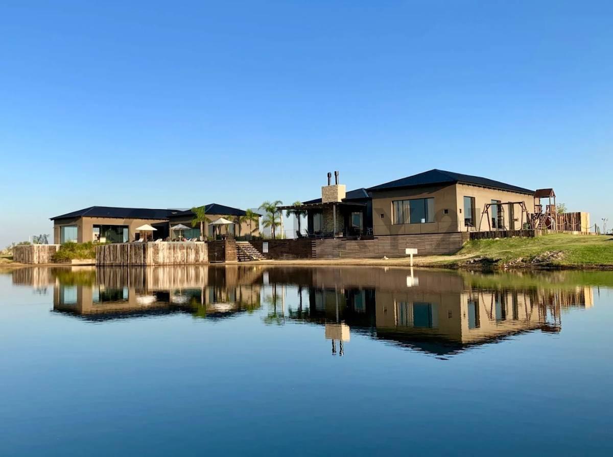 Foto de LOTE EN VENTA A LA LAGUNA EN EL NAUDIR, AGUAS PRIVADAS., imagen 2
