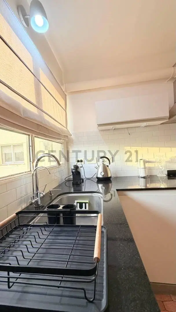Departamento de dos dormitorios con cochera, reciclado 2