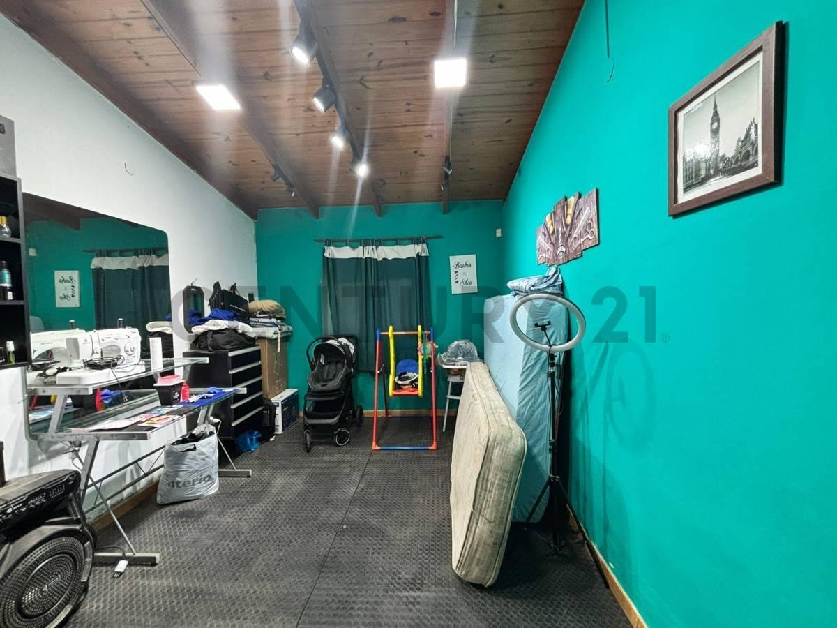 Foto de Casa de 2 dormitorios APTA CREDITO con jardín, quincho y cochera, imagen 4