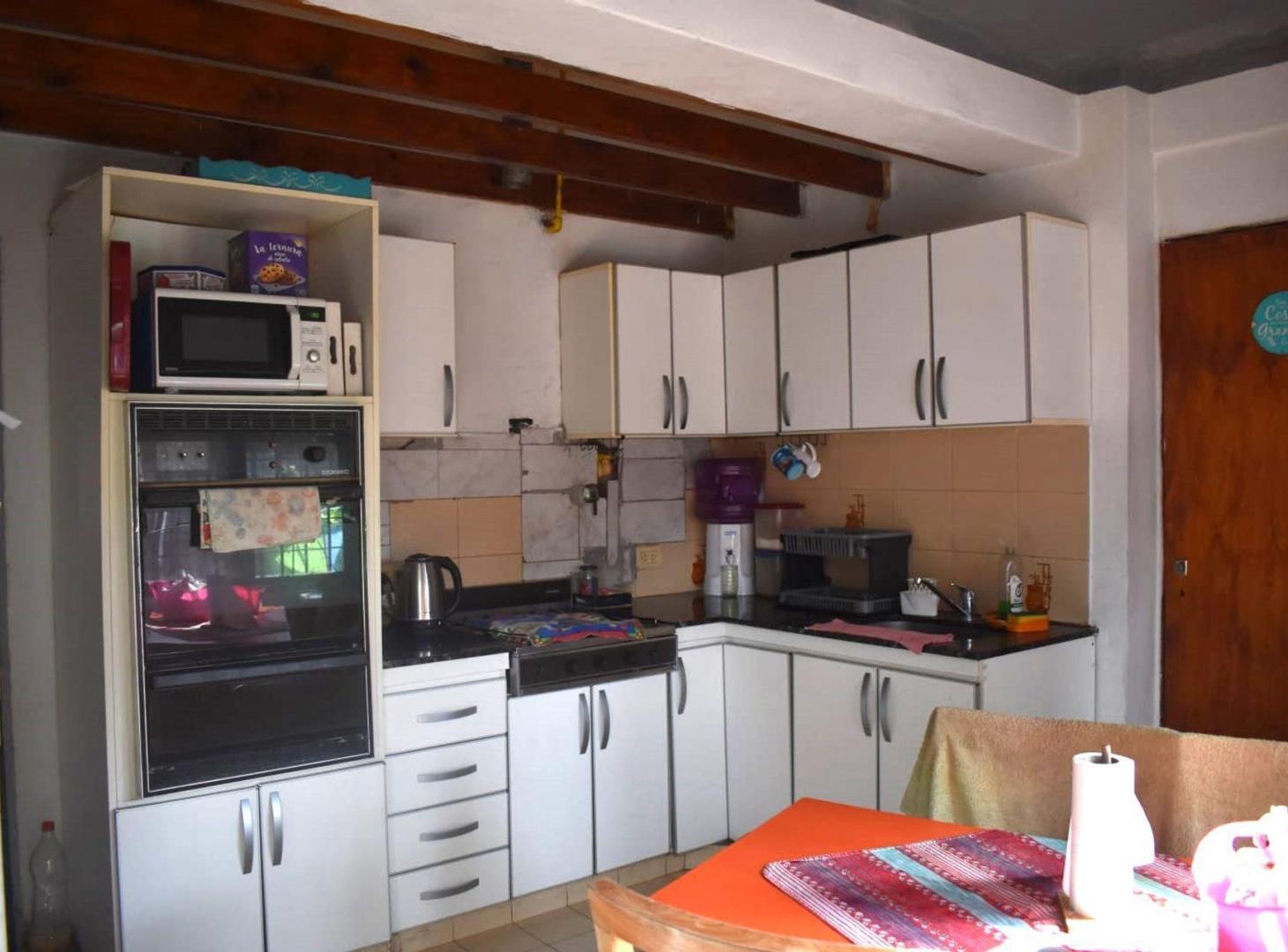 Foto de VENTA CASA 3 DORMITORIOS CON PILETA Y JARDIN MERLO, imagen 5