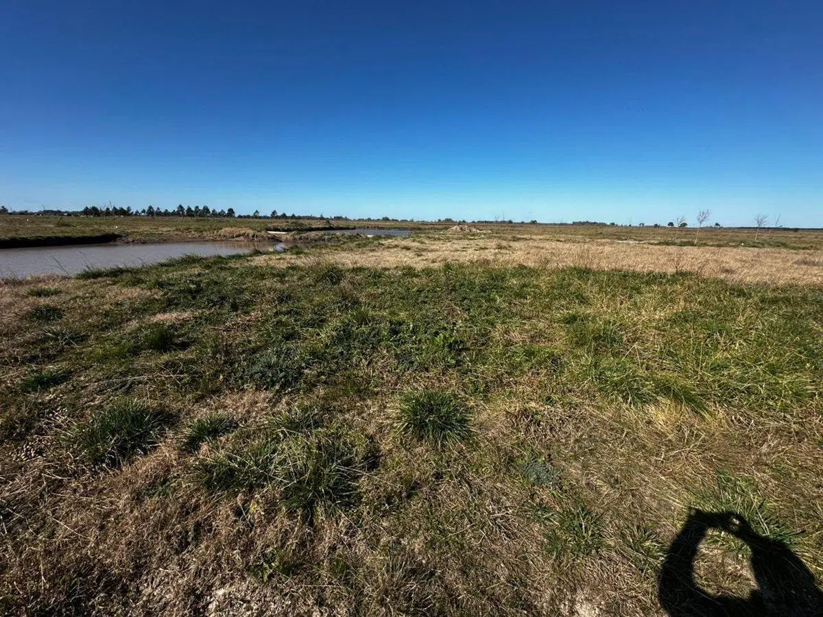 LOTE EN VENTA EN BARRIO CERRADO RUTA 2 KM 65 3
