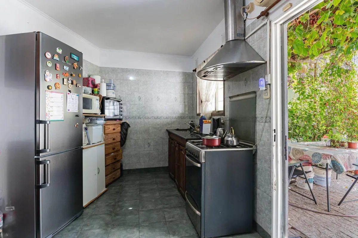 CASA EN VENTA 3 DORMITORIOS OLMOS 4