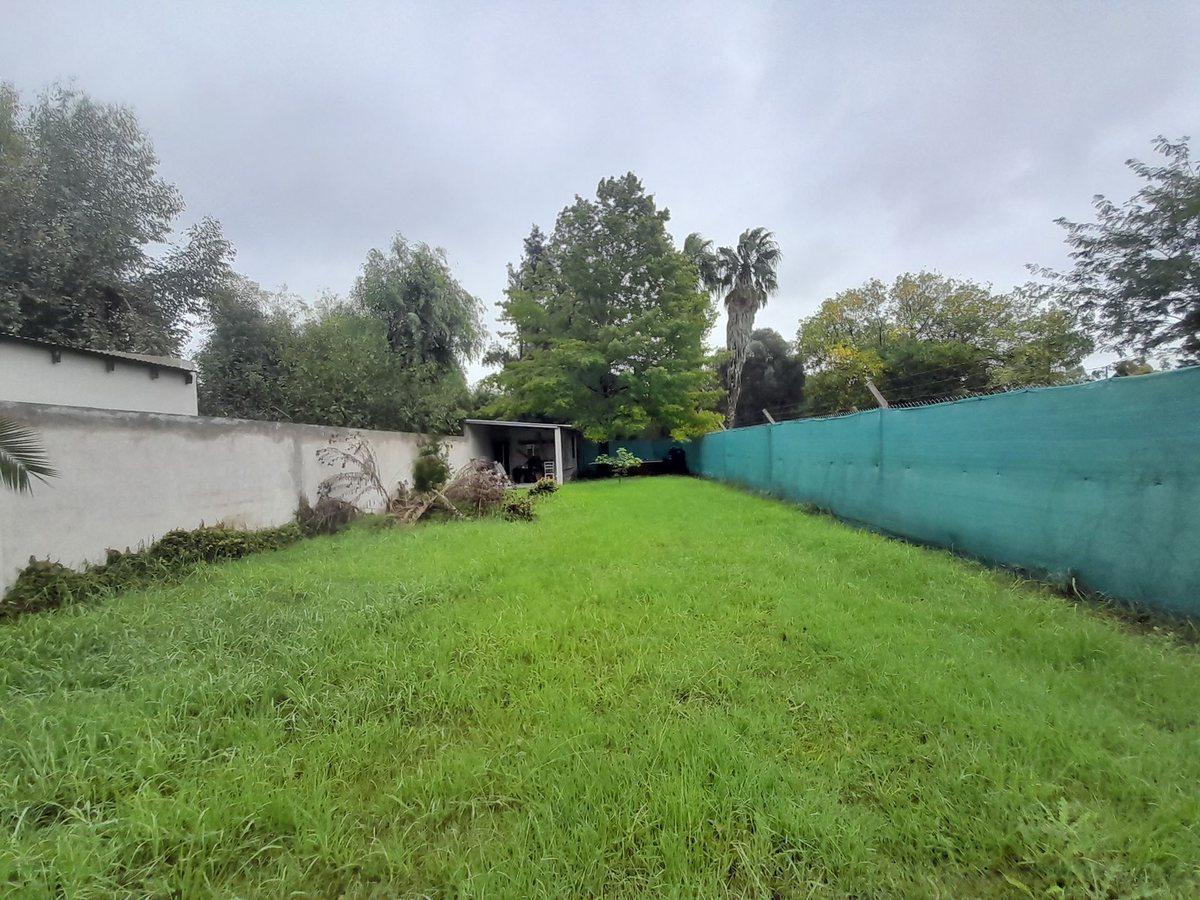 Foto de LOTE EN VENTA GONNET ENTRE CAMINOS PERMUTA, imagen 2