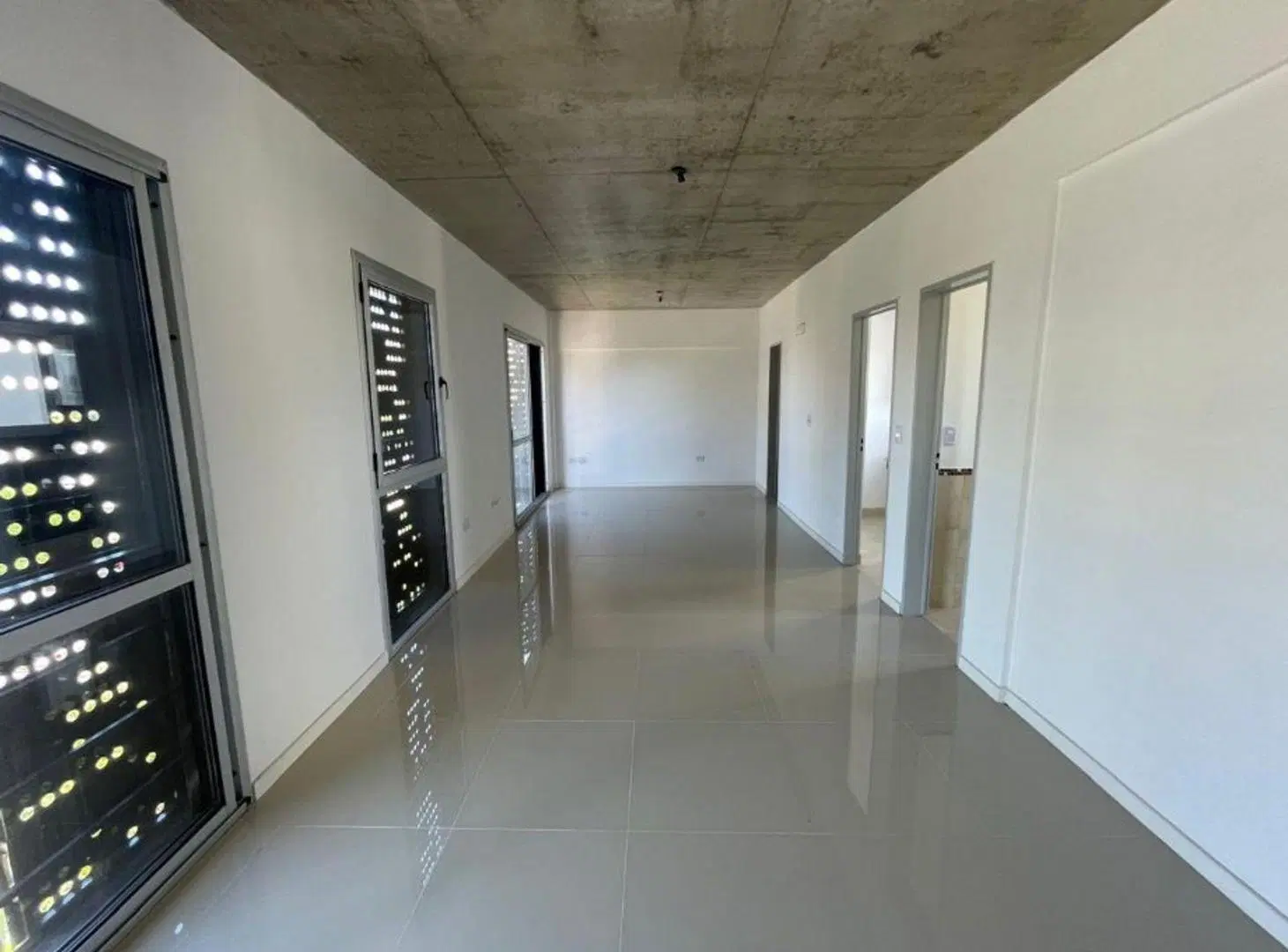 DEPARTAMENTOS DE 2 AMBIENTES C/ BALCON - COCHERAS OPCIONALES - 8