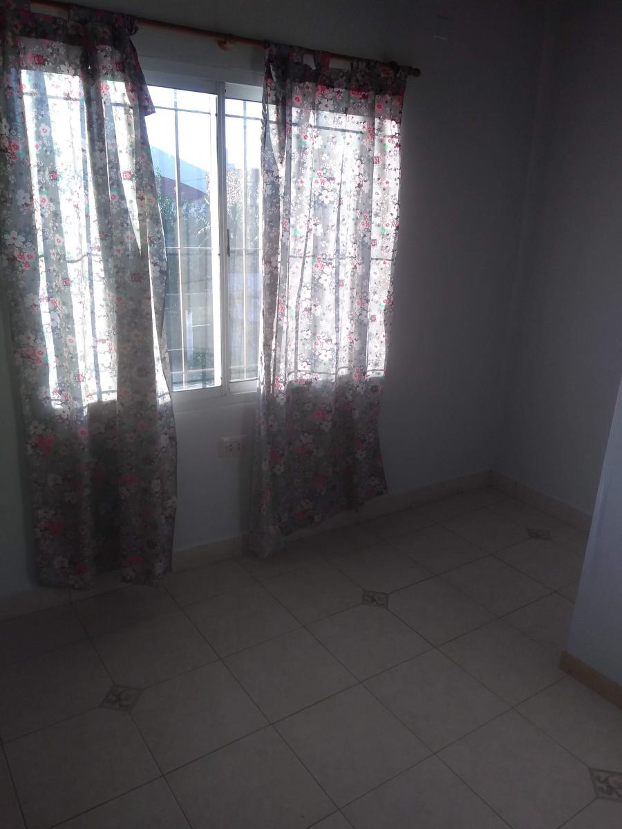 VENDO AMPLIA CASA IDEAL DOS FAMILIAS EXCELENTE UBICACIÓN