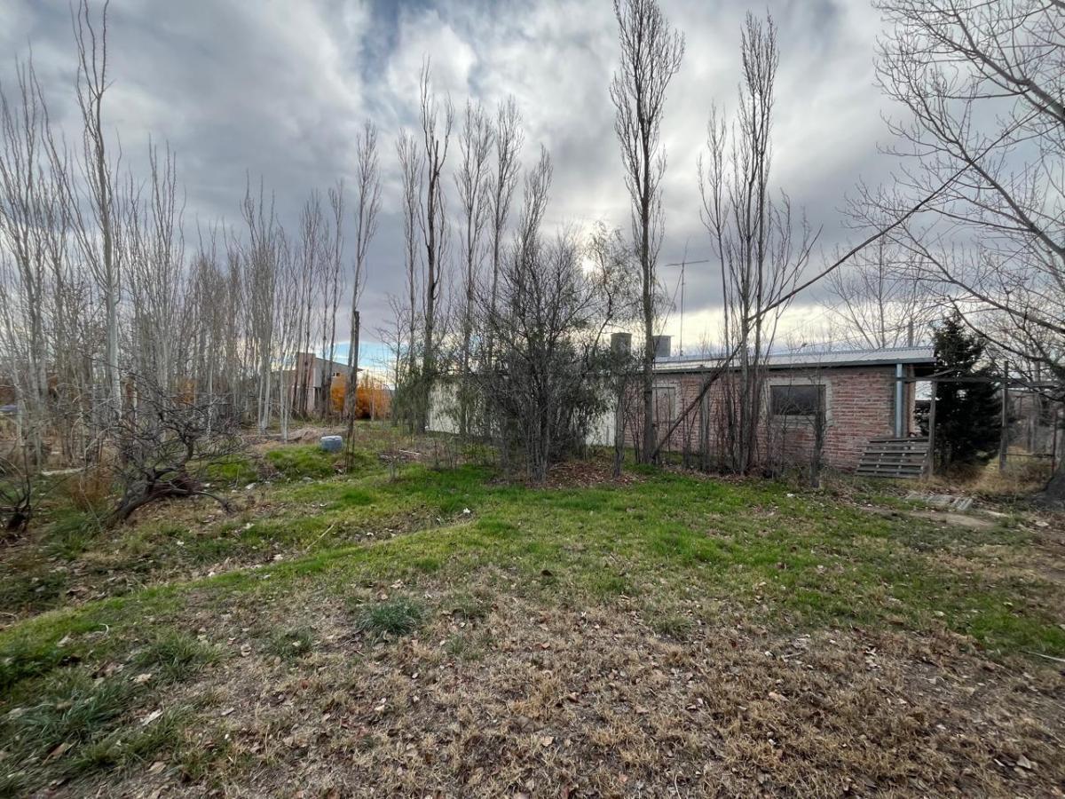 Parcela de 1.400 m² con Casa a Refaccionar 5