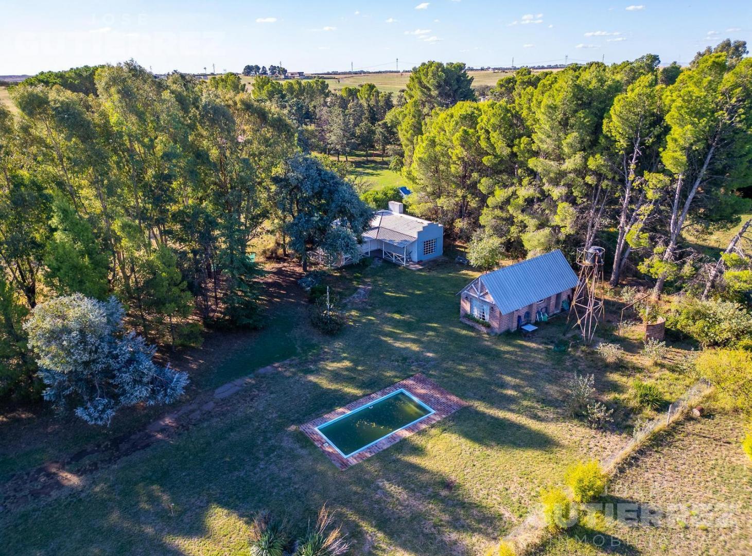 Foto de Casa quinta en venta con pileta y quincho, Barrios Las Lomitas, Bahía, imagen 4