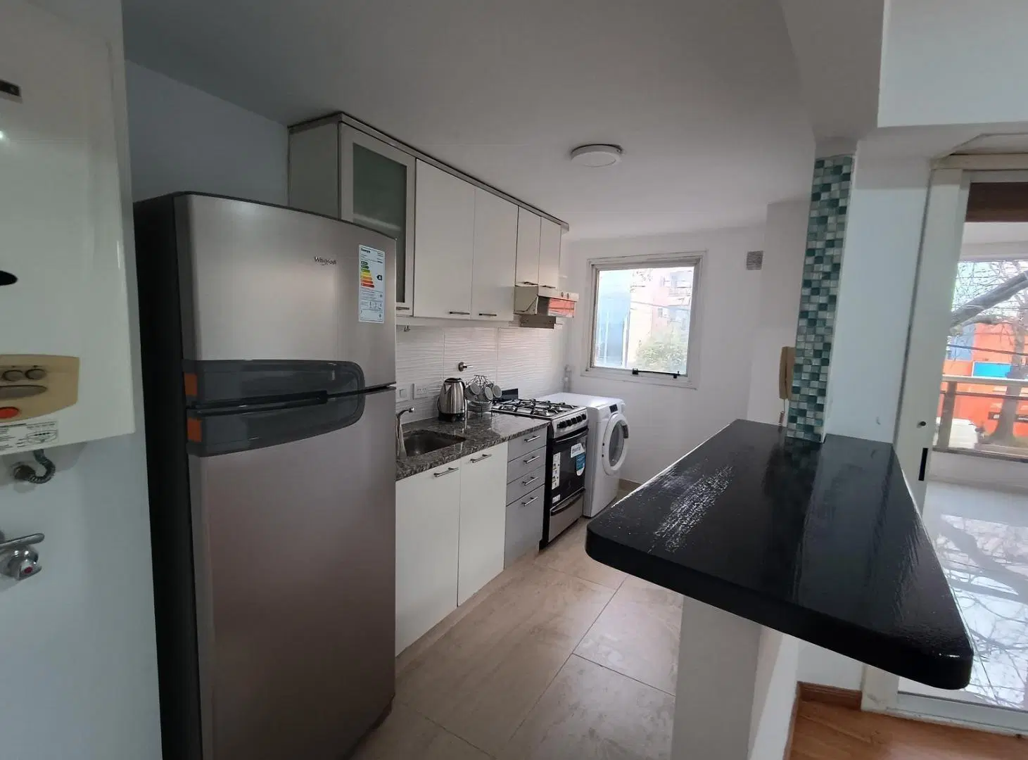 Departamento de 2 dormitorios con cochera en venta 5