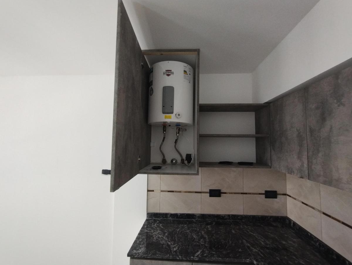 Foto de Departamento en venta de 2 ambientes con cochera en Luzuriaga, imagen 4