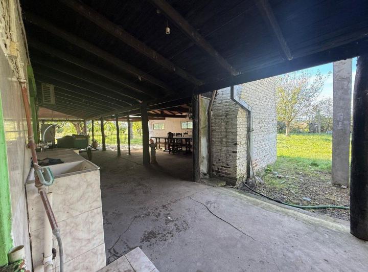 CASA EN VENTA CON PILETA DE 2.55HA EN COL CAROLINA 5