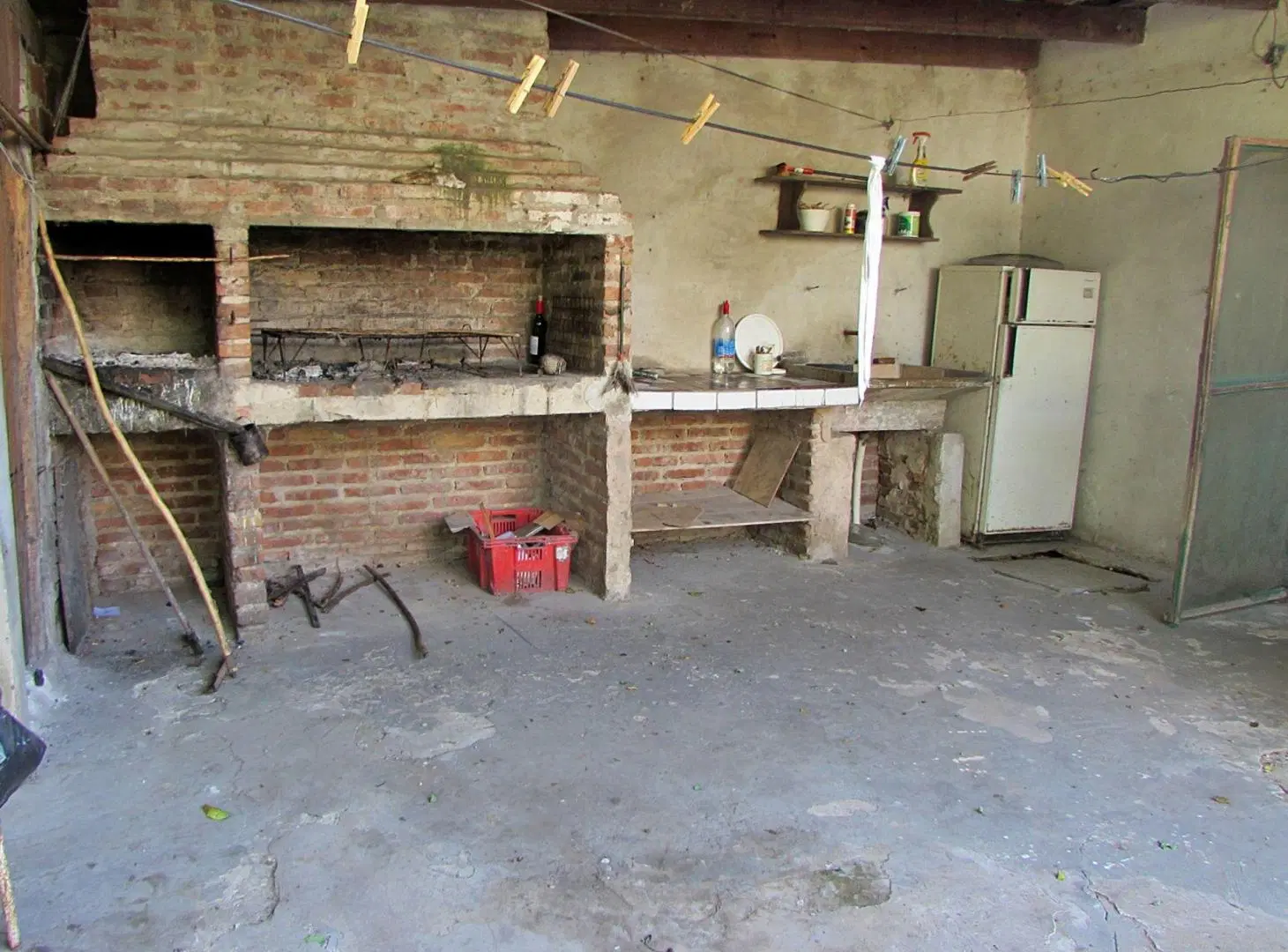 CASA CON LOCAL COMERCIAL POR AV. 9 DE JULIO Nº 573 2