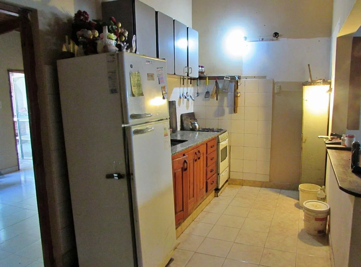 CASA CON LOCAL COMERCIAL POR AV. 9 DE JULIO Nº 573 4
