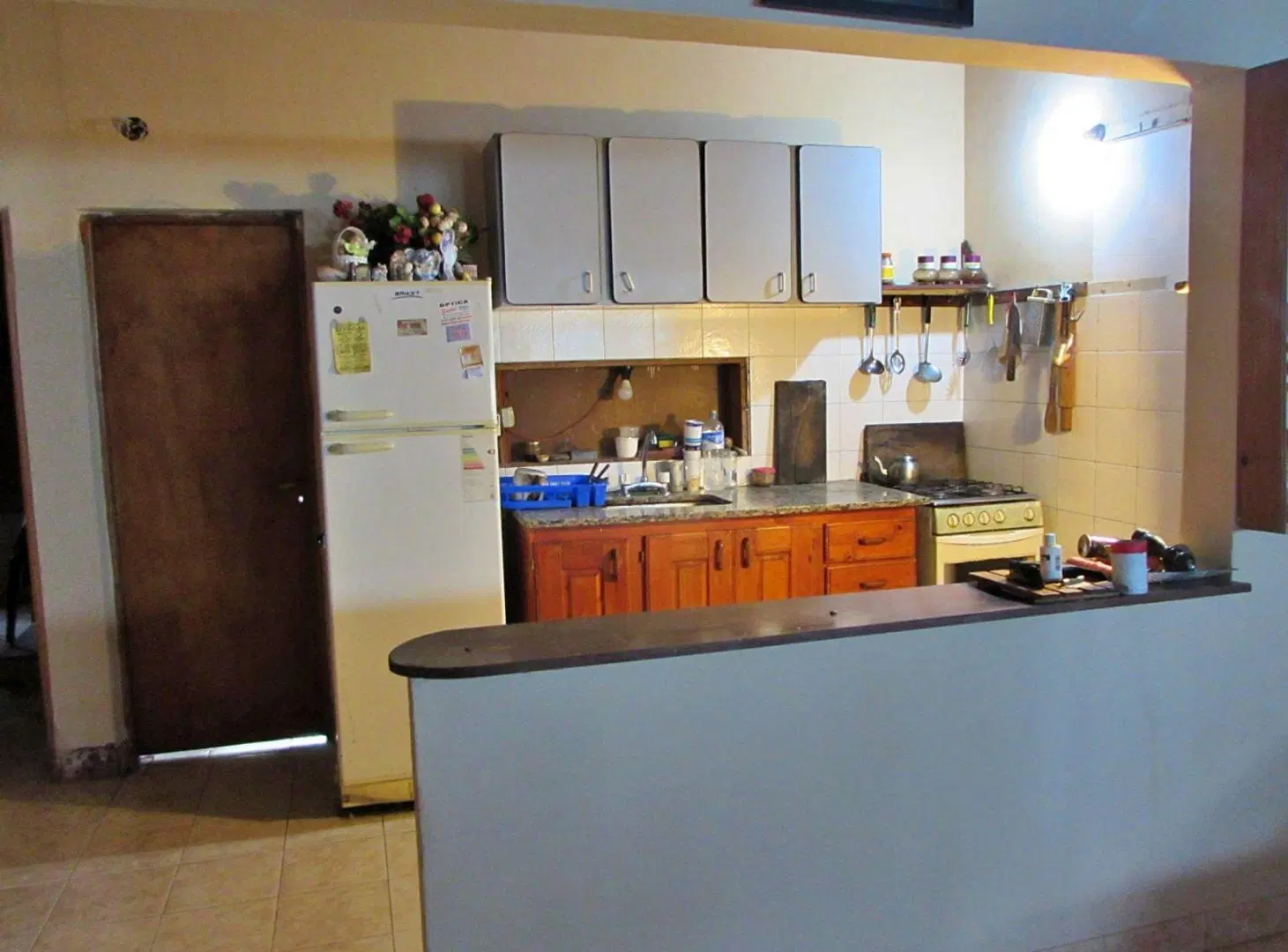 CASA CON LOCAL COMERCIAL POR AV. 9 DE JULIO Nº 573 5