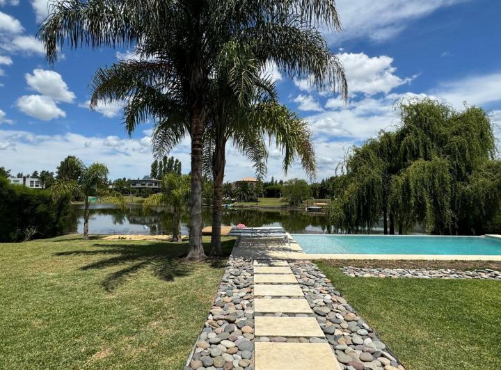 Casa en venta y alquiler temporal 4 dormitorios  a la Laguna / San Francisco, Villa Nueva Benavidez 1