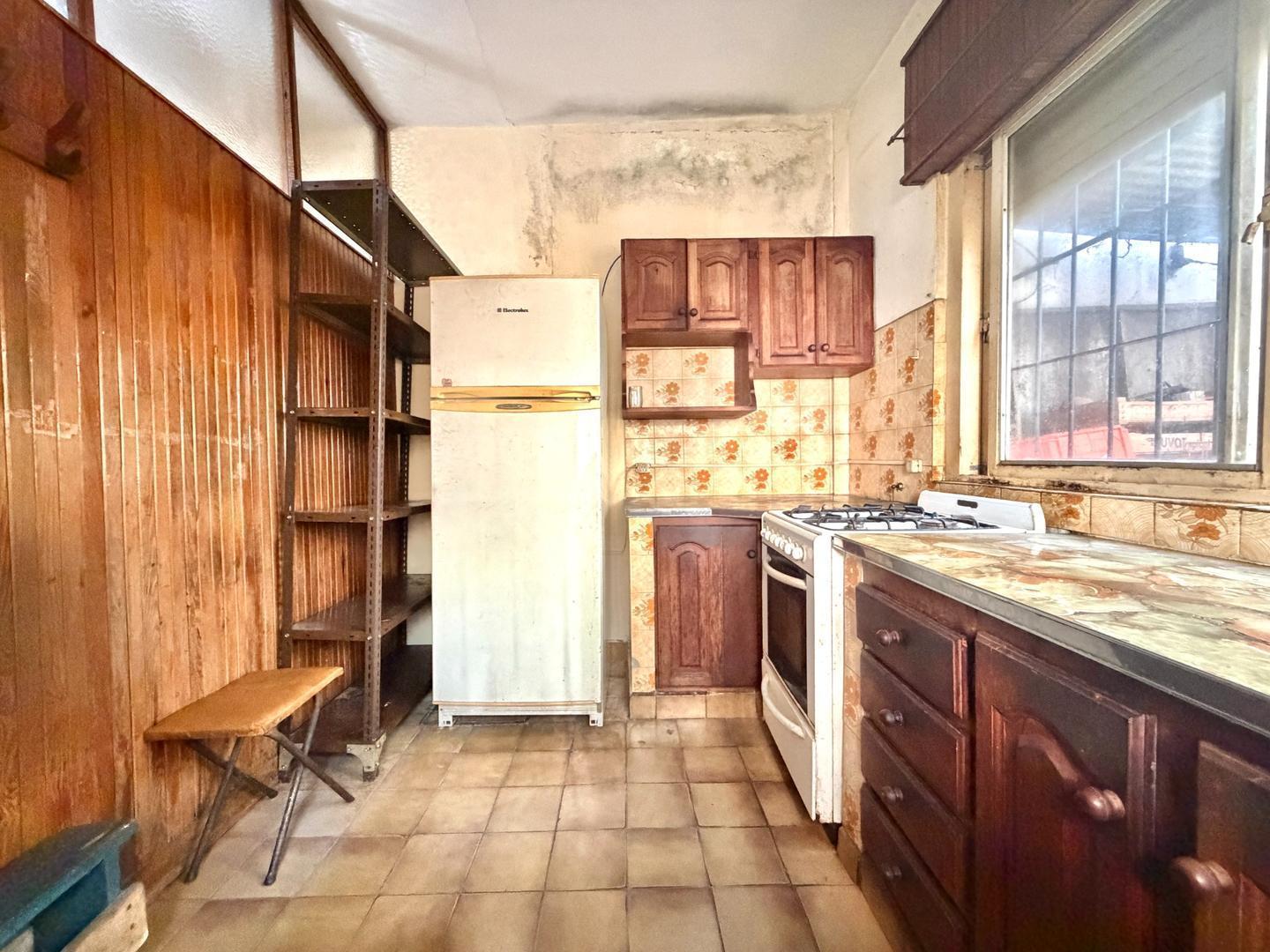 VENTA PH 4 AMBIENTES CON COCHERA, LOCAL Y TERRAZA