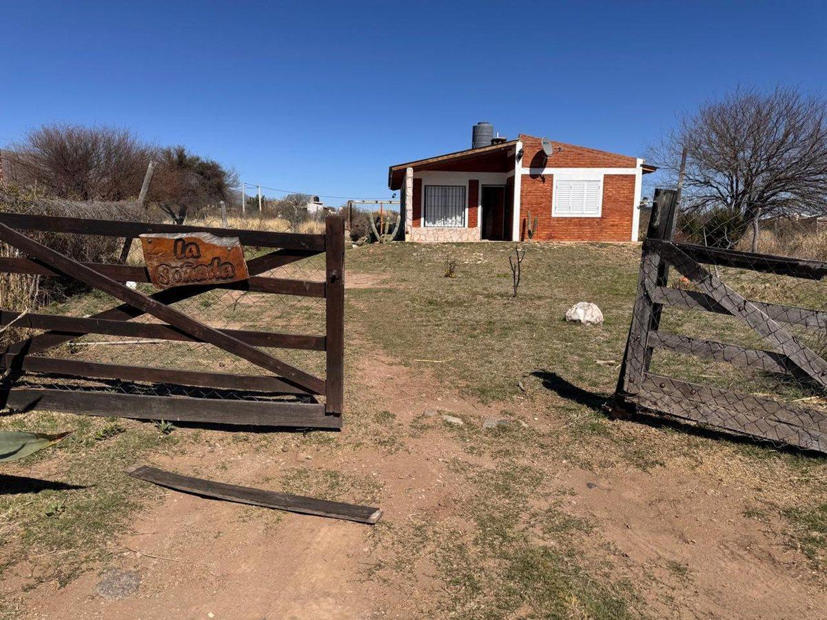 CASA CON CABAÑAS EN VENTA