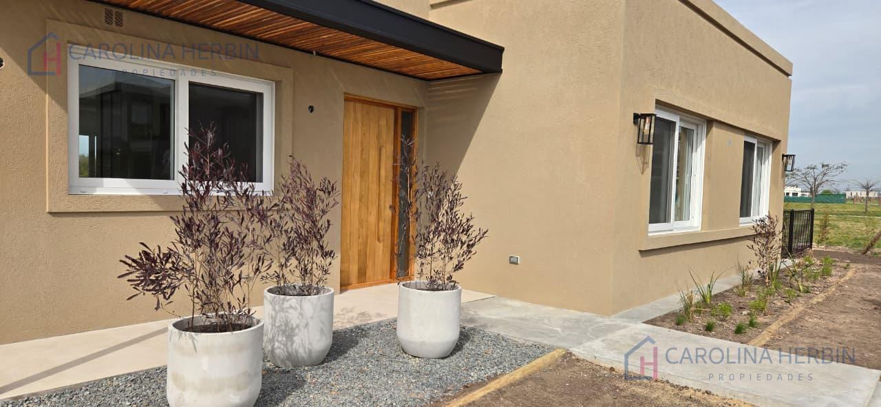 Foto de Casa en venta en el barrio cerrado Village Joven, Bella Vista, imagen 2