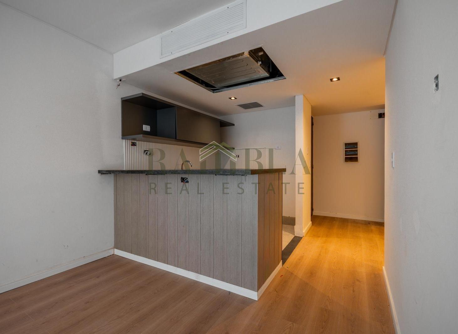 Foto de Departamento 2 Amb + Den en Venta Lumiere Blvd Madero 71mts2 Amenities, imagen 2