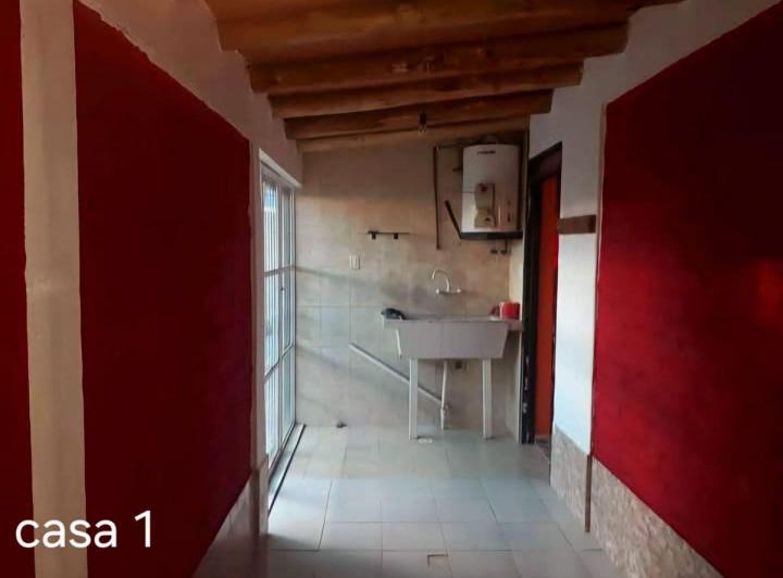 OPORTUNIDAD DE INVERSION: CASA + 2 DEPARTAMENTOS 3
