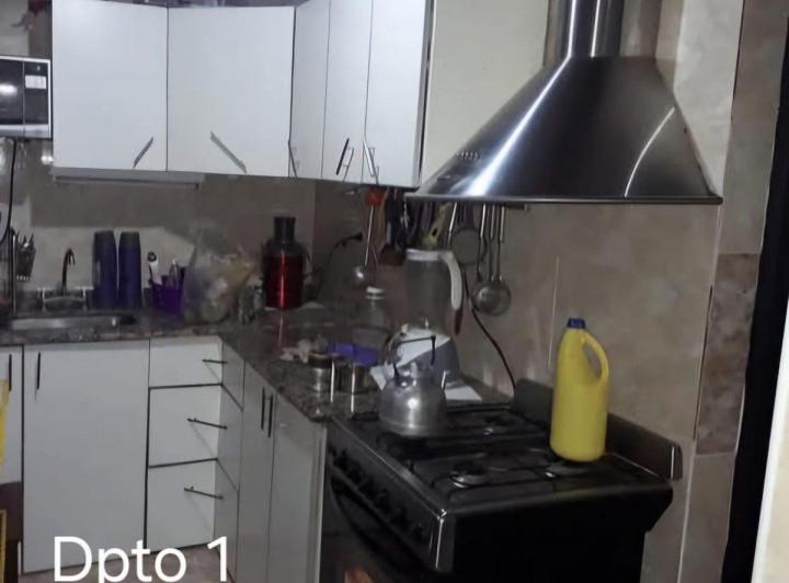 OPORTUNIDAD DE INVERSION: CASA + 2 DEPARTAMENTOS 5