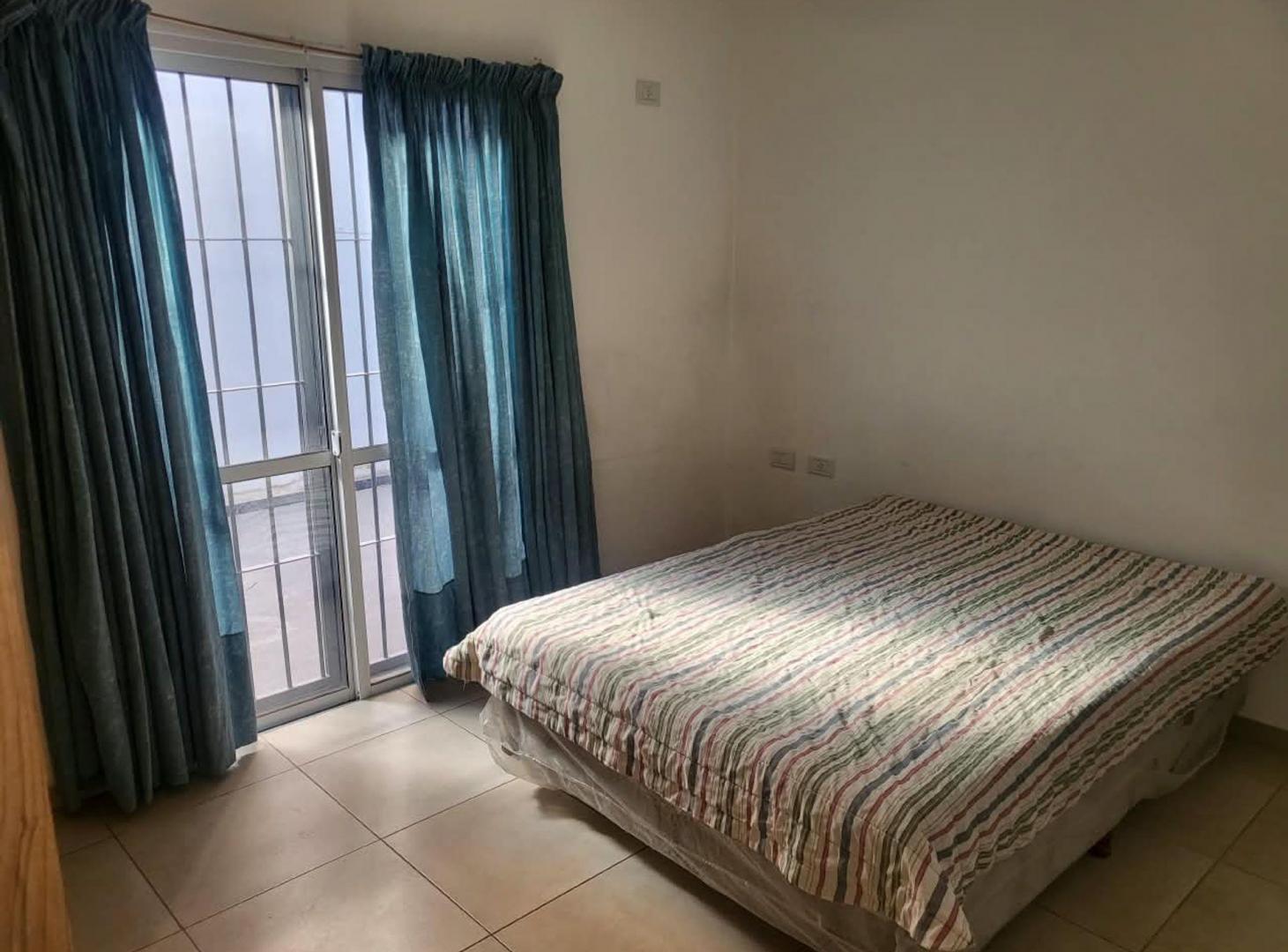 Foto de DEPARTAMENTO DE 2 DORMITORIOS CON COCHERA Y PATIO, imagen 2