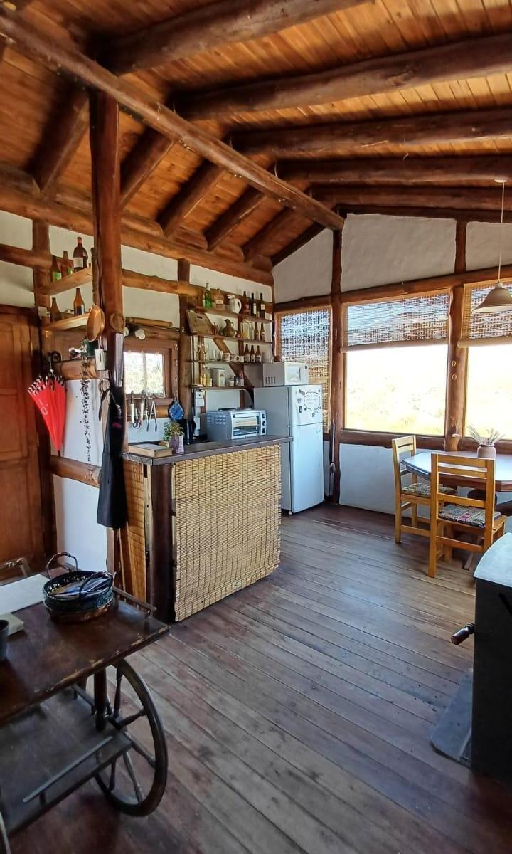 VENDO CABAÑA EN POTRERILLOS USD 63.000 EXCEPCIONAL VISTA. TOTALMENTE AMOBLADA .