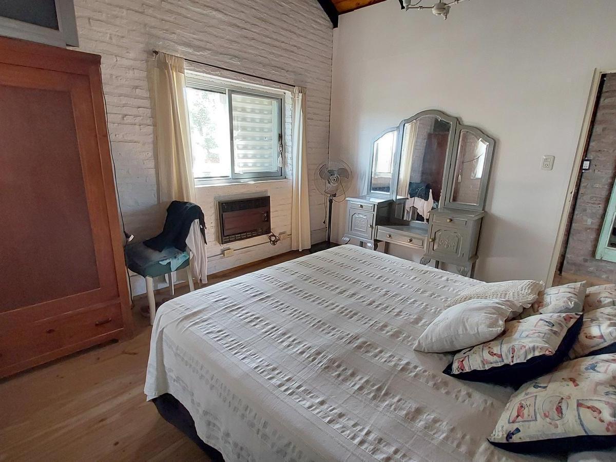 Venta Casa de 2 Dormitorio con Pileta en Ricardone. con Galería. 5