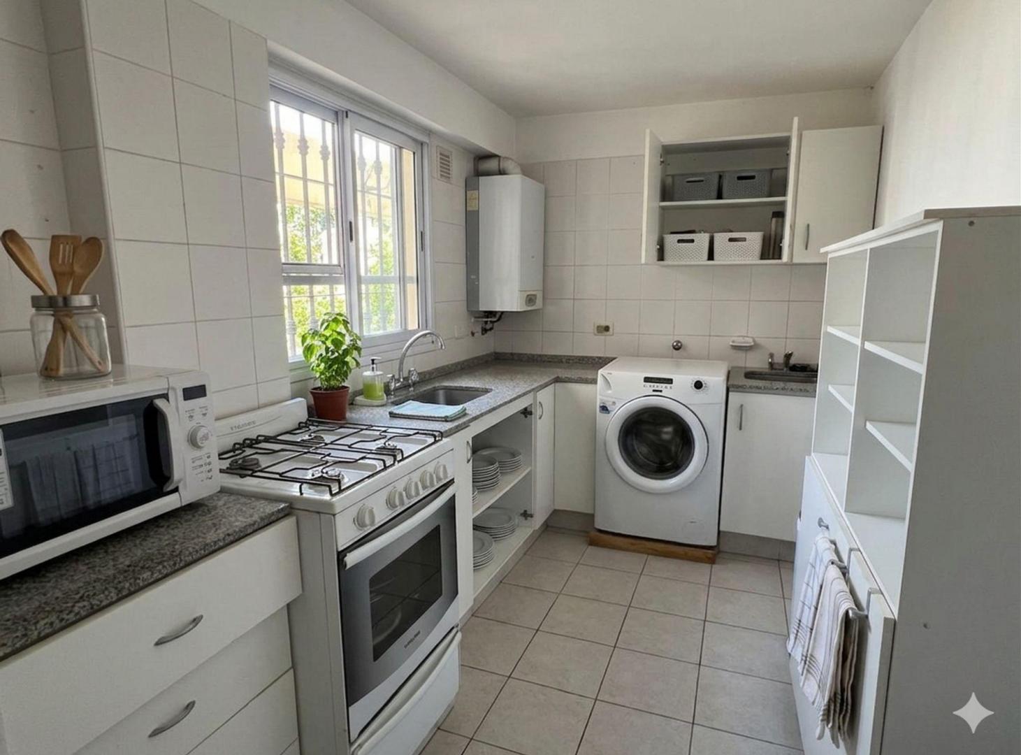 Foto de VENTA DPTO 2 DORMITORIOS CON COCHERA ZONA CENTRO, imagen 2
