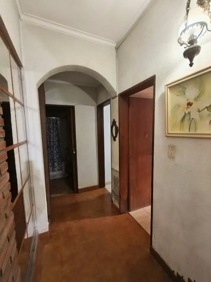 Casa interna con cochera y patio verde 5