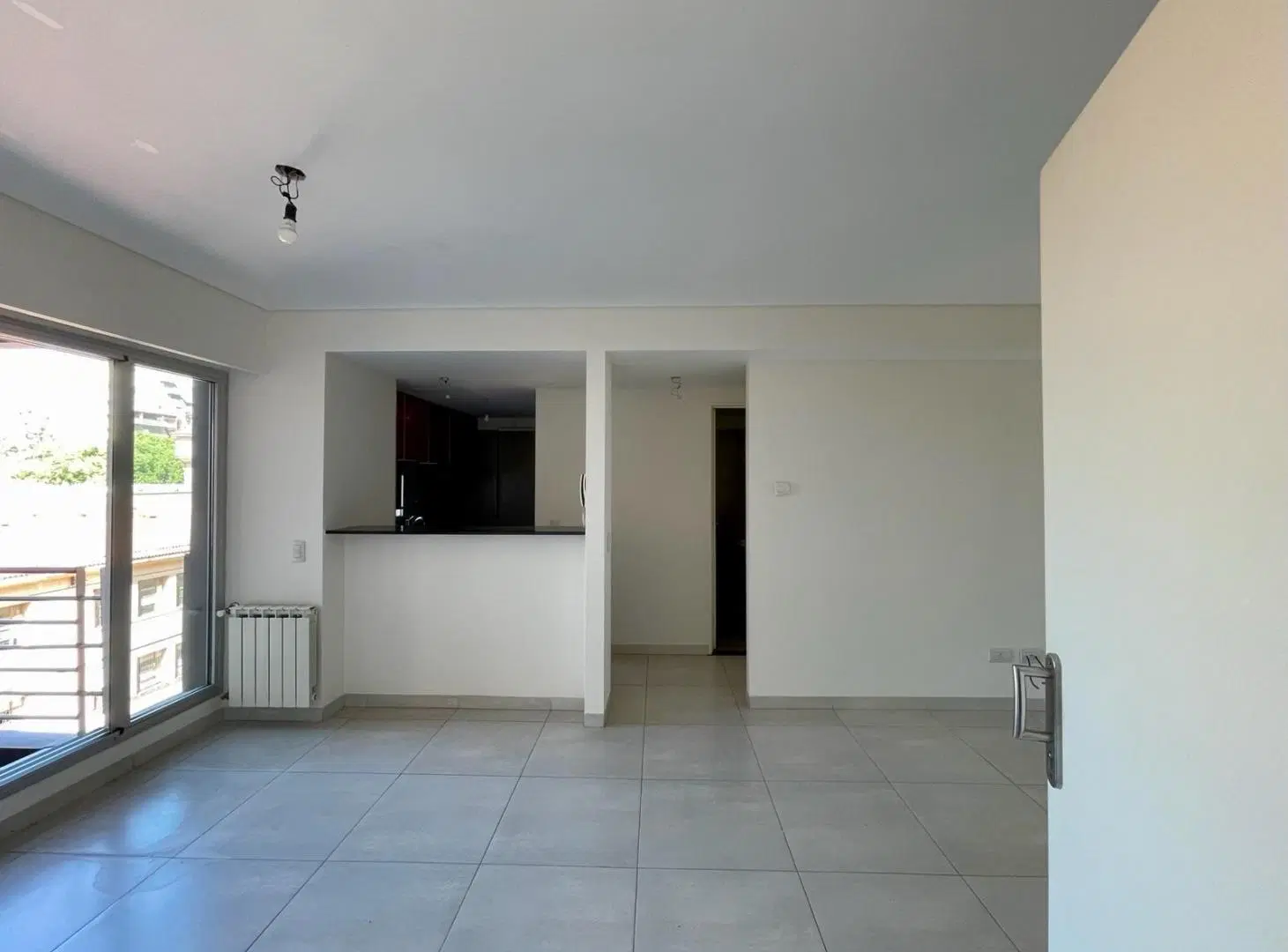 Departamento un dormitorio, cochera y baulera - Parrillero - Barrio Martin 2