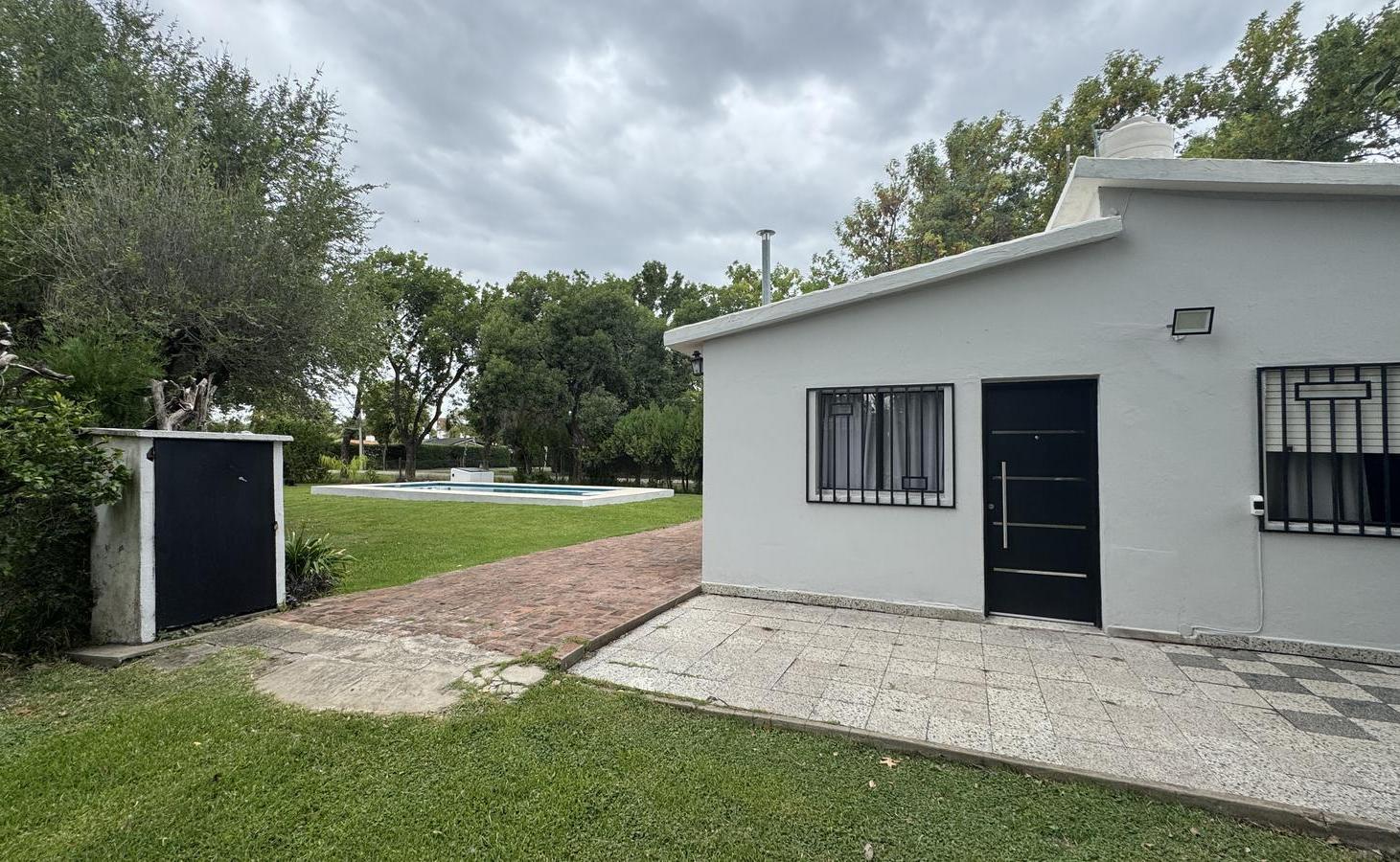 Foto de Casa en Funes con Pileta, terreno de 1055 mts2, imagen 1