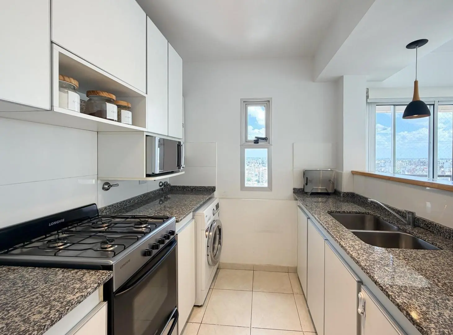 VENTA DEPARTAMENTO DE DOS DORMITORIOS VISTA PARCIAL AL RIO - BARRIO MARTIN, ROSARIO 2