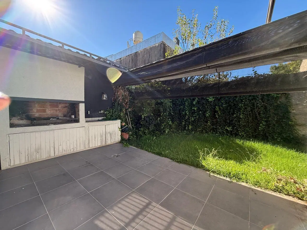 VENTA - Casa de un dormitorio con patio y parrillero - Sarmiento, Rosario. 2